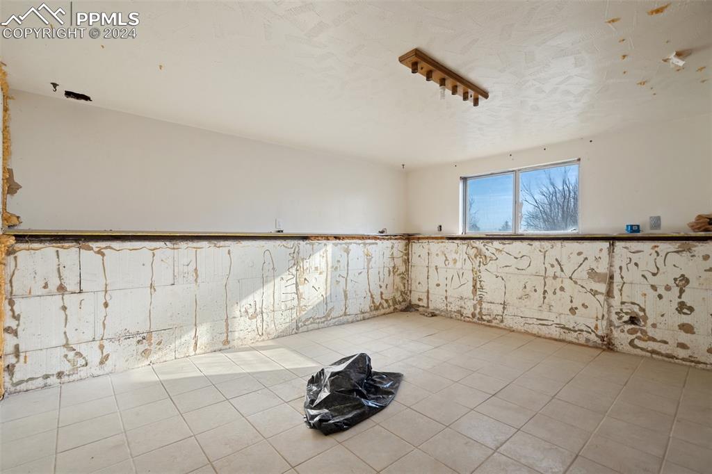 Unfinished basement bedroom