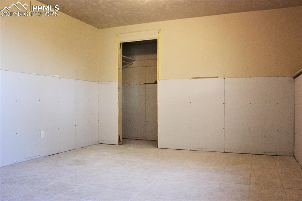 Unfinished bedroom in basement (sheetrock recently added)