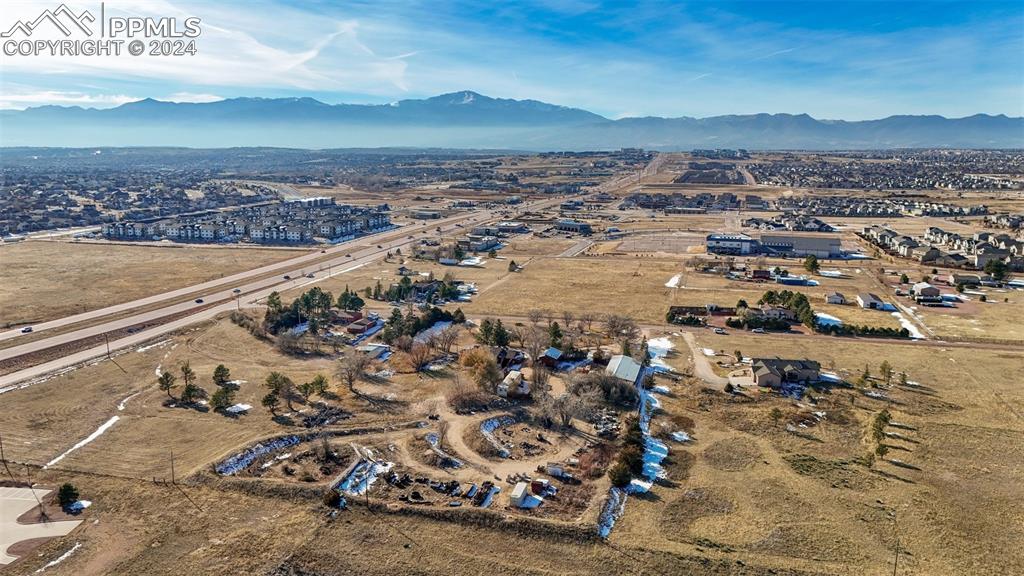 Bird's eye view looking west to the mountain range - Woodmen Road to the south (left)