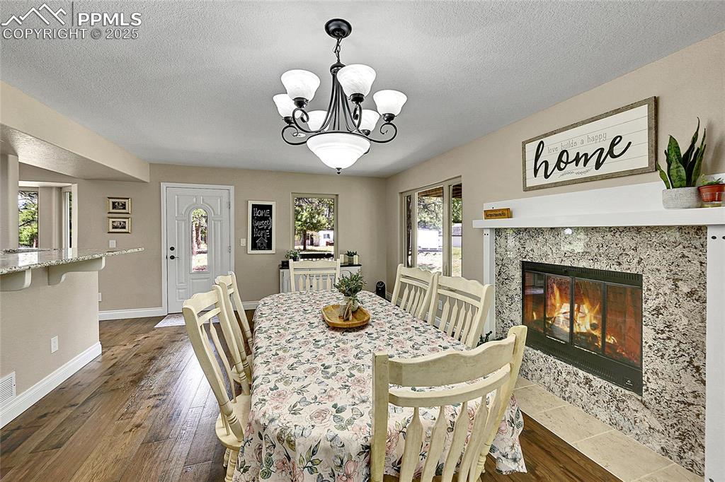 Formal Dining area walk out with fireplace