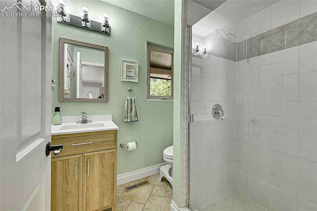 Main level bathroom with shower 