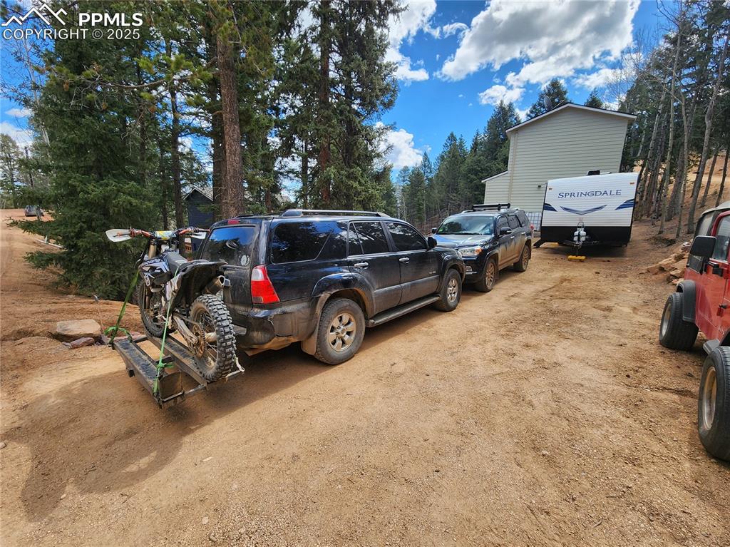 Outside you will find plenty of driveway parking for your vehicles, RV's and more!