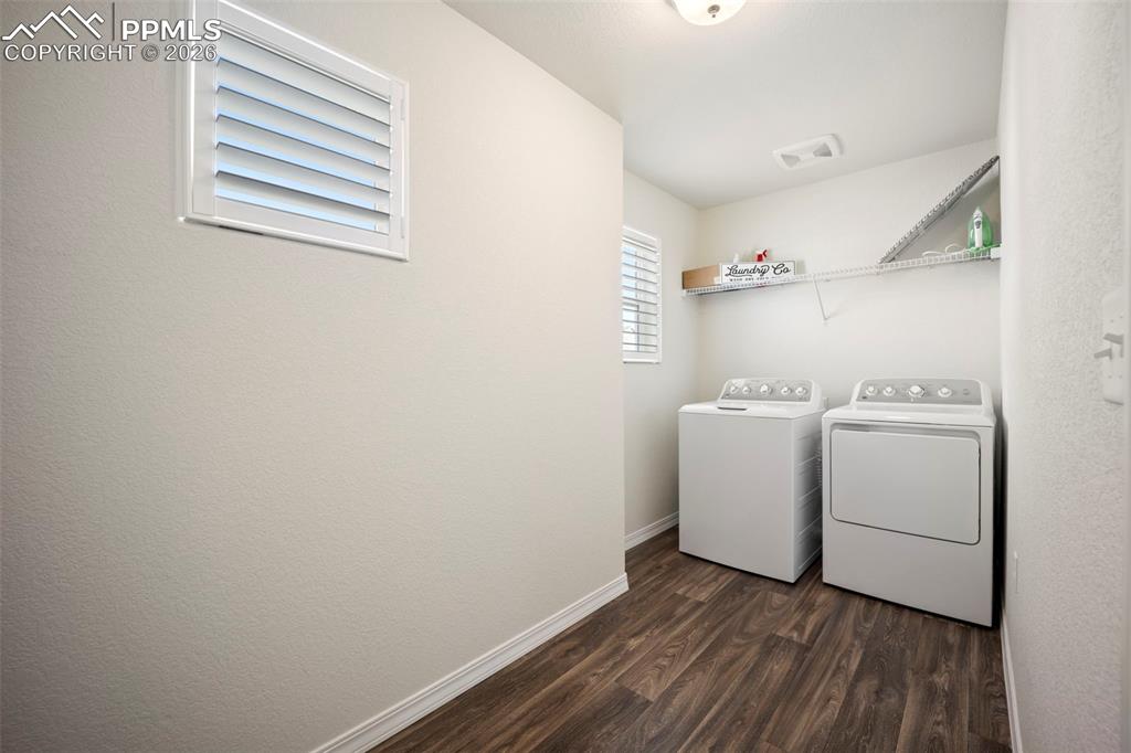 Upper level laundry room w/2 windows