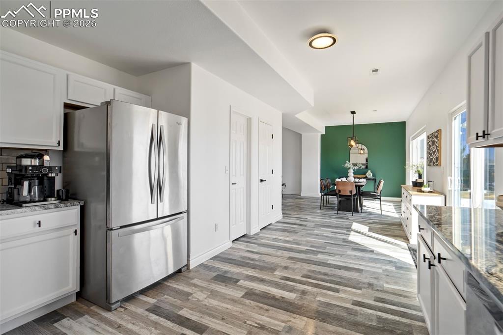 Kitchen with a coffee nook & a pantry. 
