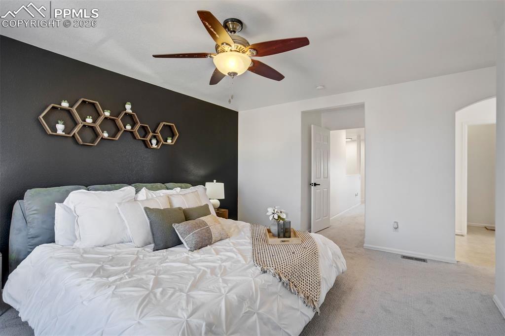 A primary suite that says, “you’ve earned this.”