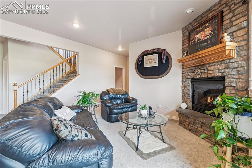  Featuring a stone fireplace