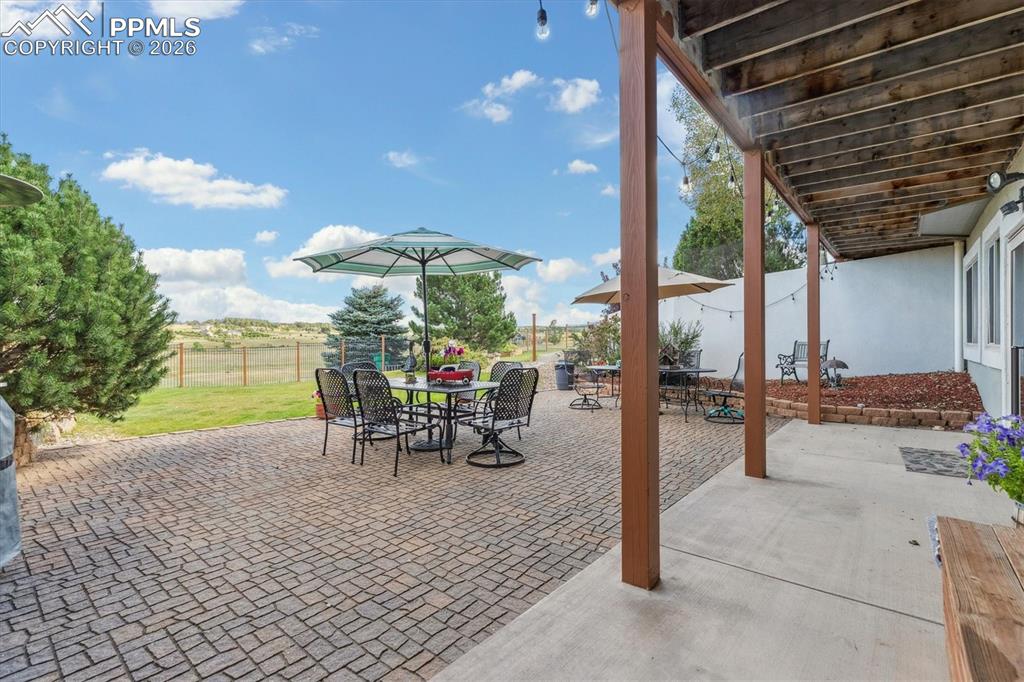 View of patio featuring outdoor dining space