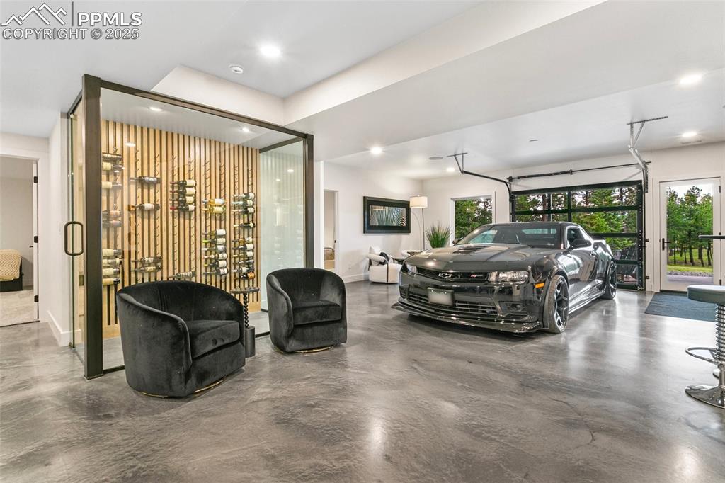 Yep! Thats a car in the Lower Level Family room! Not a car fan? A pool table or ping pong table or a large Entertainment space awaits. 