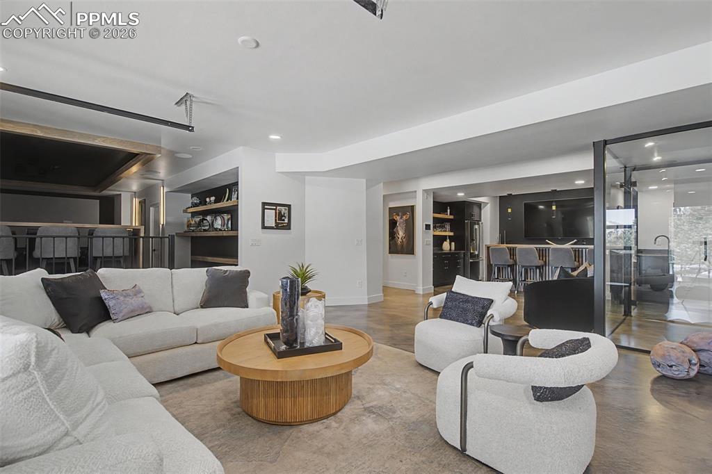 Flexible entertainment space near the Theatre, wine cellar and walk behond bar. 