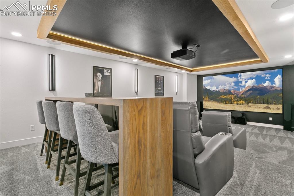 150" Theatre Screen by "screen Innovations" with an "Ambient Light Rejecting" Screen and Sony Laser Projector rivals any professional movie theatre!  Is it movie time Or Sports time?!