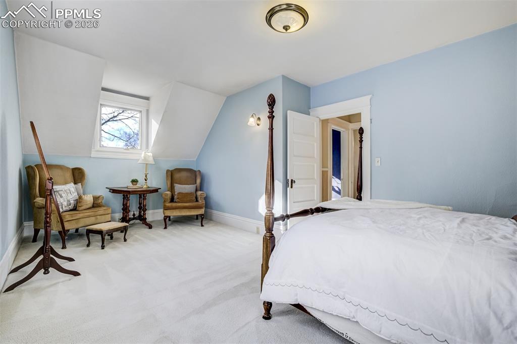 Second bedroom features a sitting area 