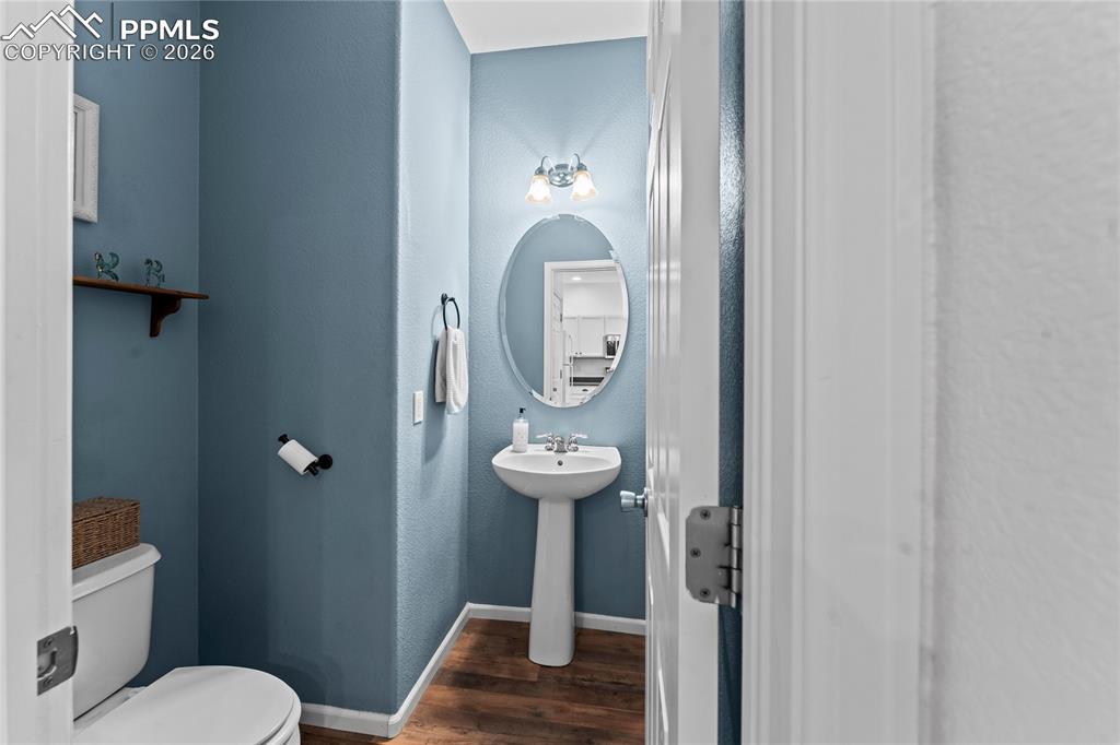 Half bathroom off of kitchen