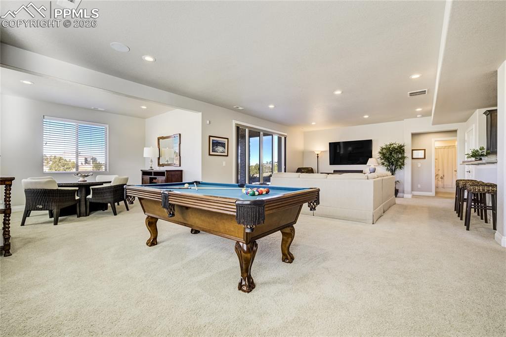 Walk-out lower level with 9’ ceilings, integrated speakers and expansive recreation space.
