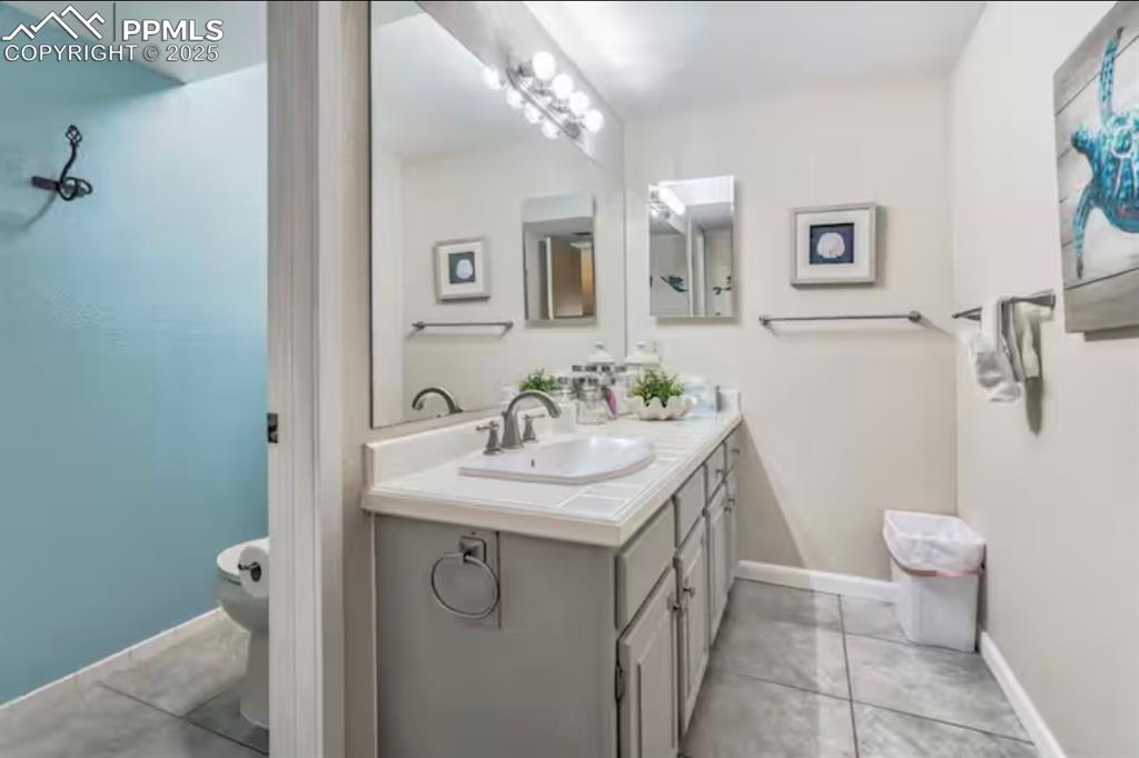 Bathroom with toilet and vanity