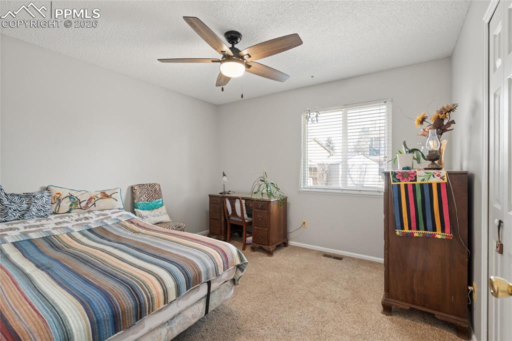 Secondary bedroom on main. Lots of light.