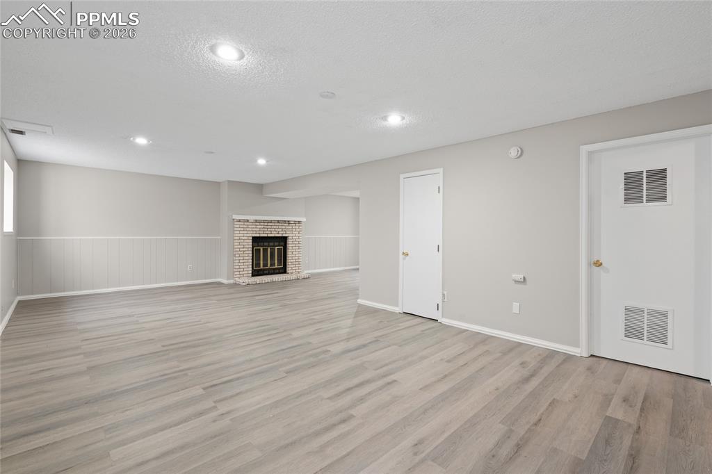 Cozy wood burning fireplace.