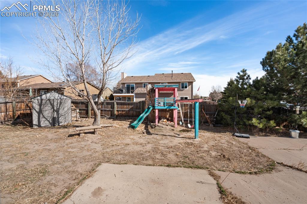 Mature trees will give some shade and privacy. This yard is a blank canvas...what will YOU create?