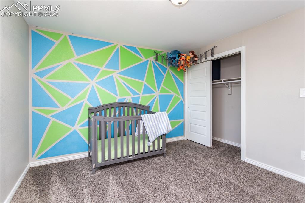 Second bedroom located on upper level with Primary bedroom