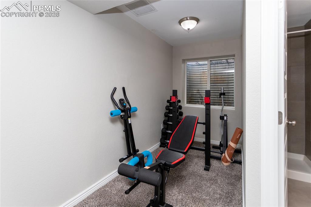 Large third bedroom has a nook that was being used as an exercise area