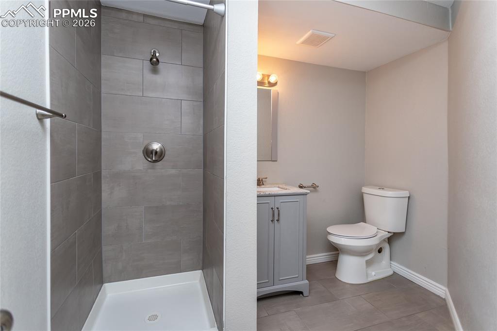 3/4 bathroom adjoining to third bedroom