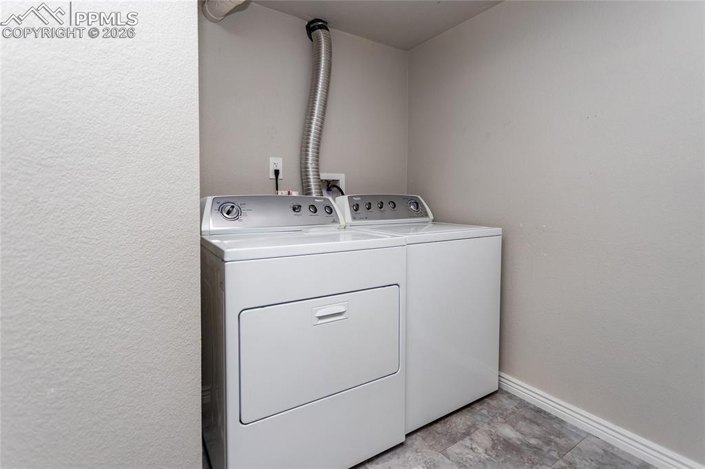 Laundry room is on basement level. Washer & dryer are included in the sale.