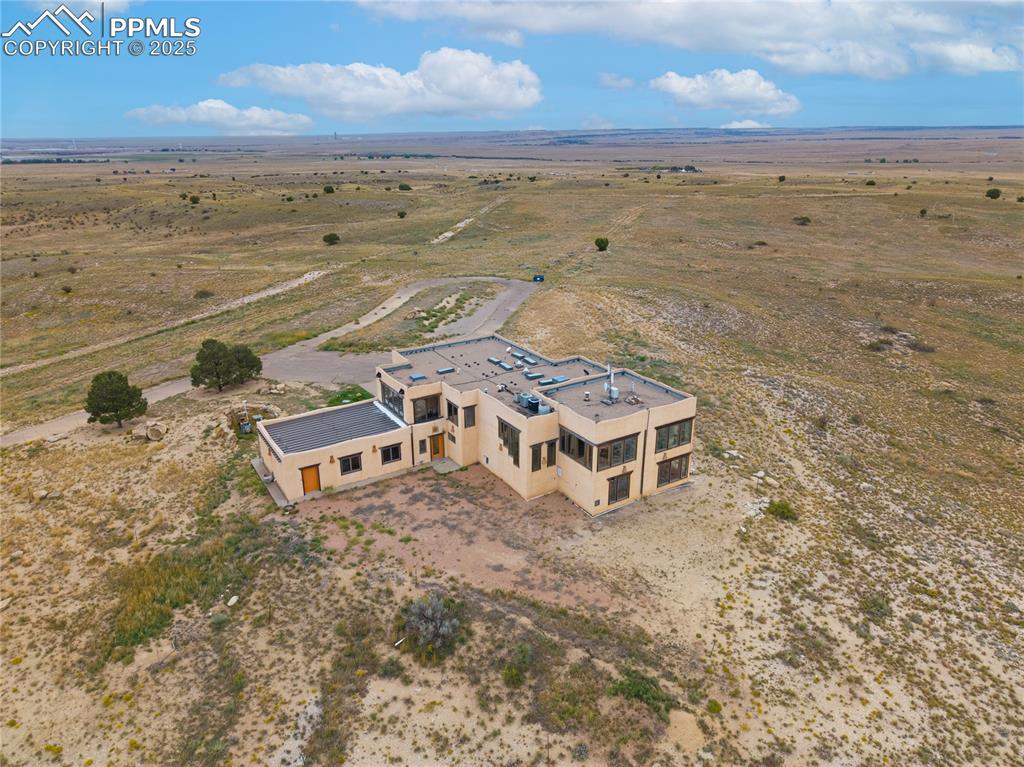 Aerial view of sparsely populated area featuring a desert landscape