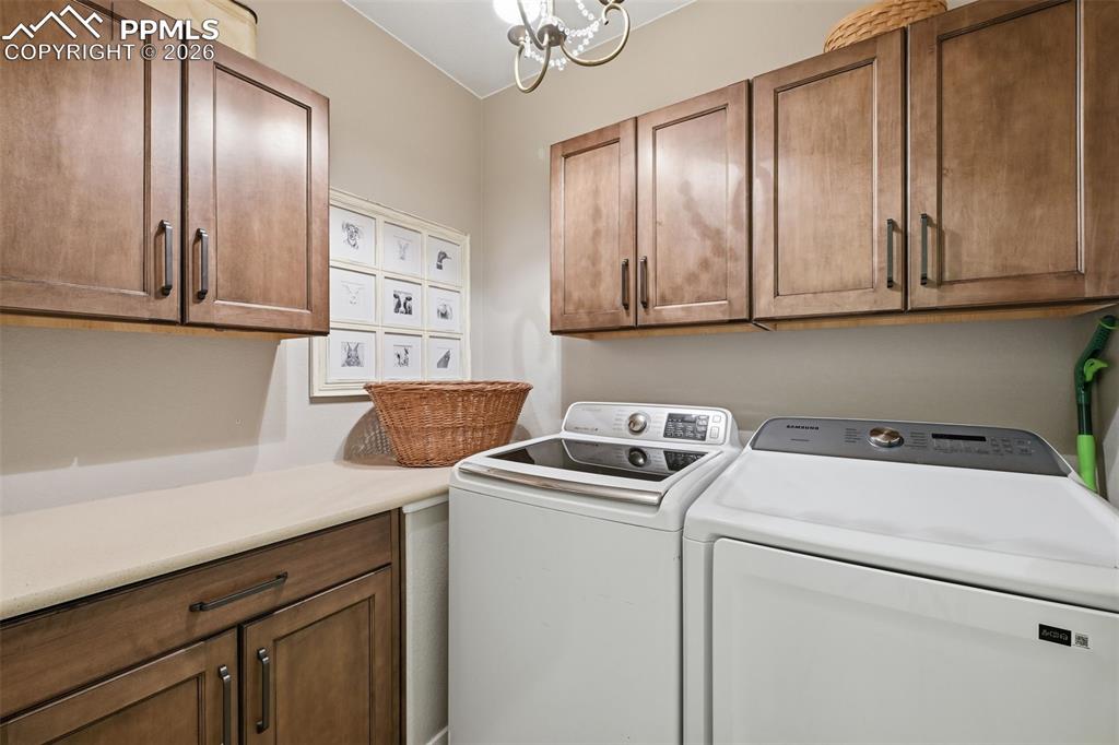 Large laundry room with extra cabinets!