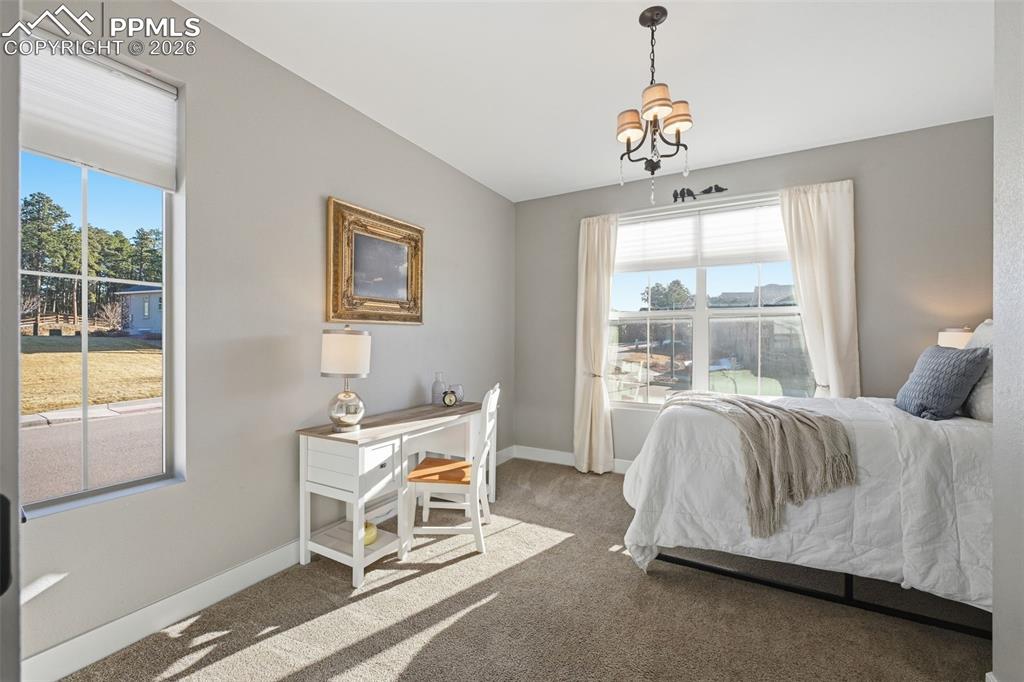 Secondary bedroom upstairs with custom lighting!