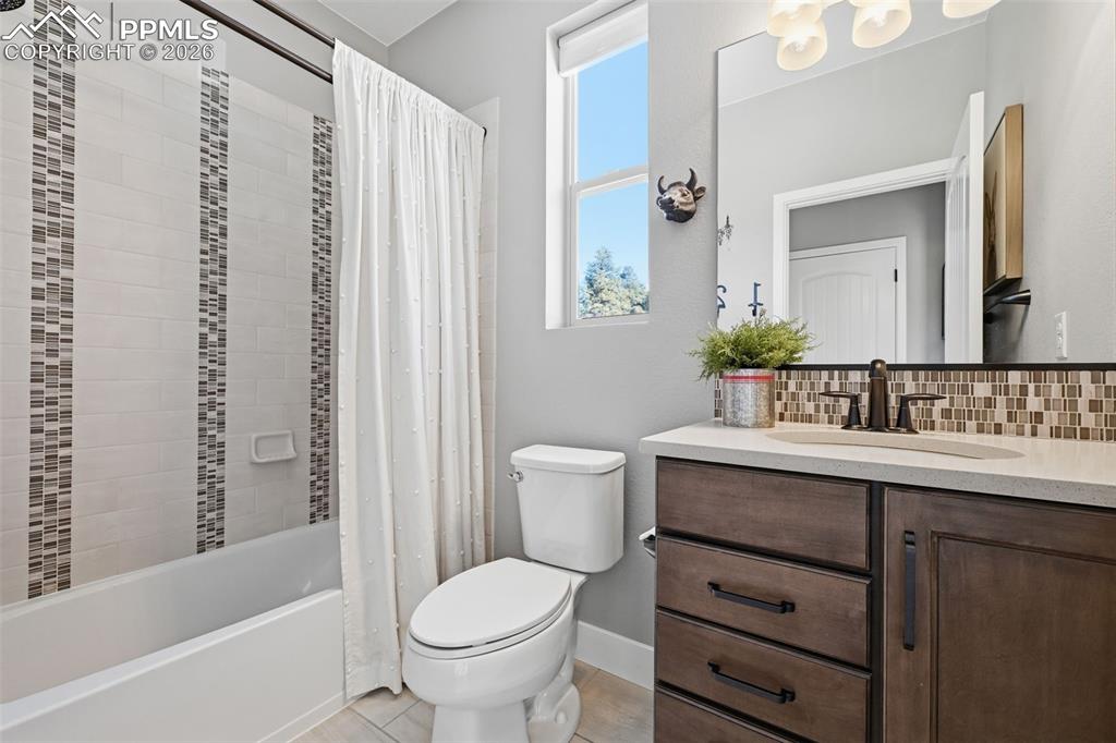 Full bath on the main level with quartz counters!