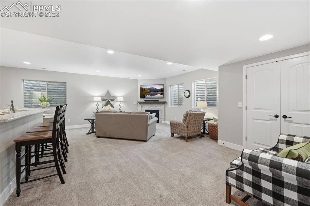 Great entertaining space in the basement with corner fireplace!