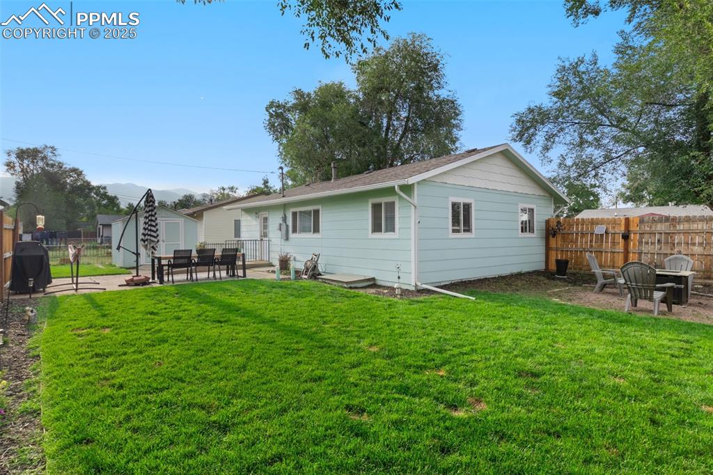 NICELY LANDSCAPED & FENCED BACKYARD