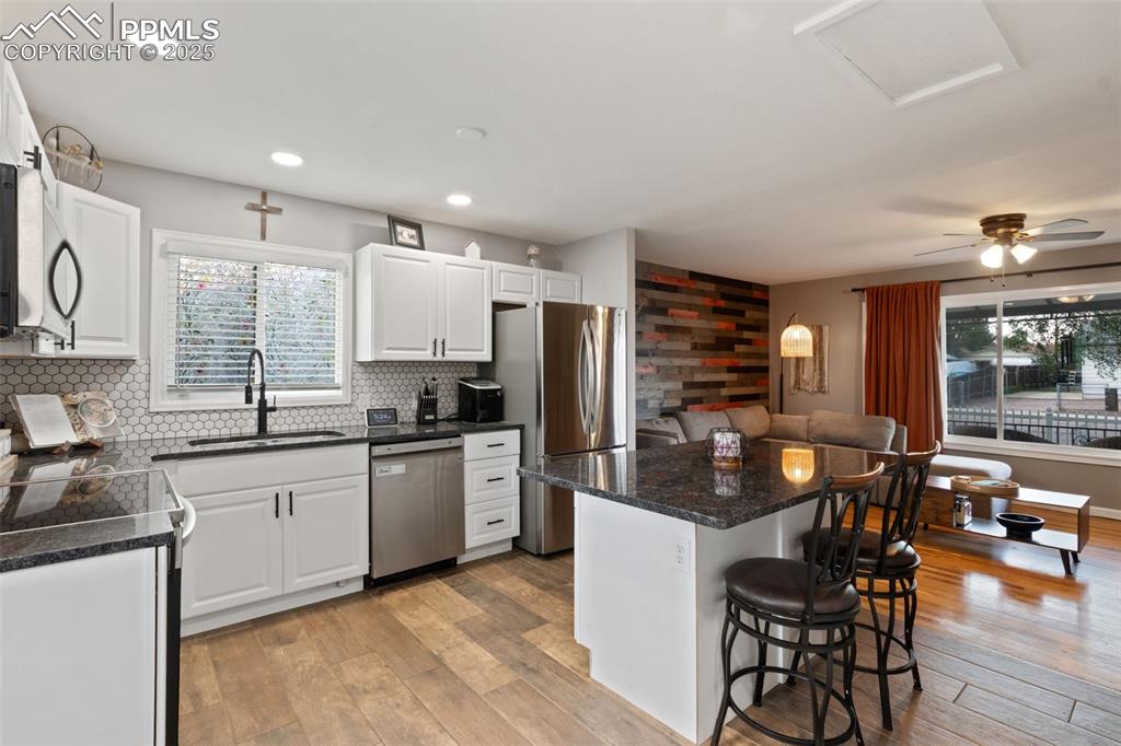 KITCHEN HAS STAINLESS STEEL APPLIANCES