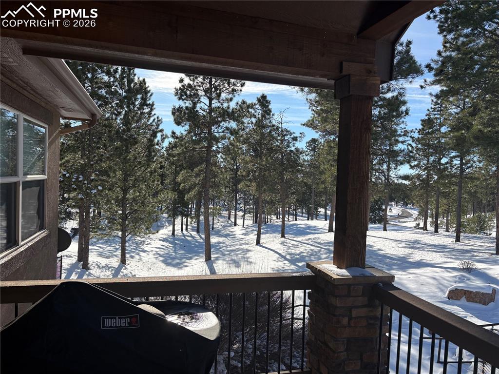 Out back door to left 