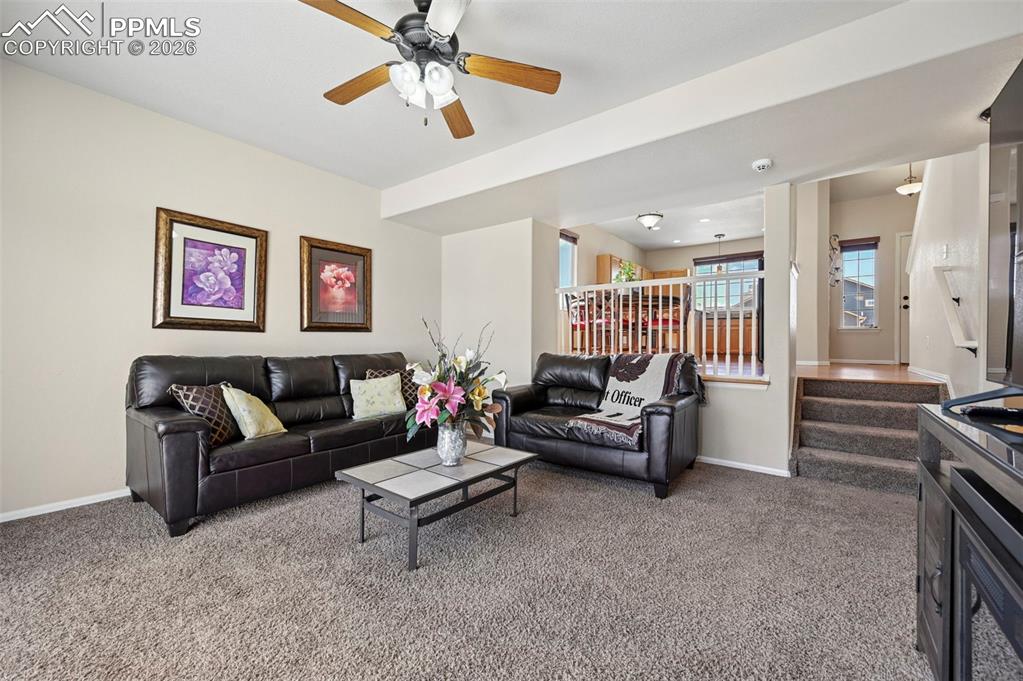 A sunken family room that radiates warmth and coziness.