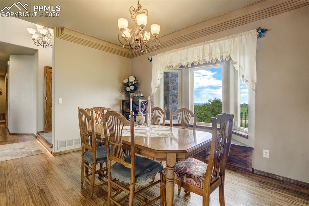 Formal dining room with city light views to the North, East, and South