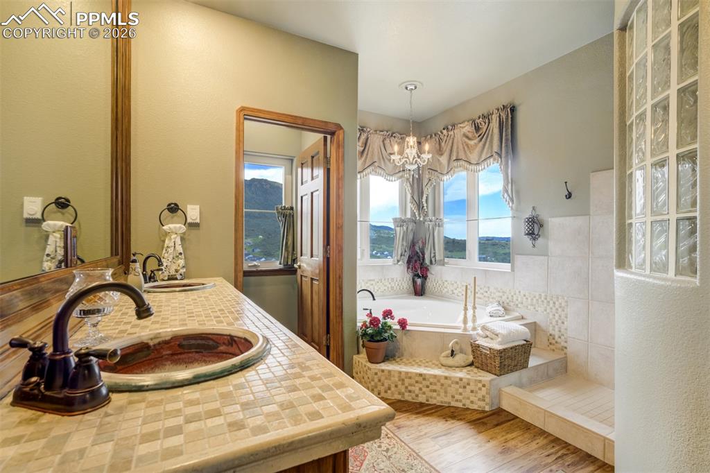 5 pc Master bath with soaking tub, double vanity, large walk-in shower, and separate water closet 