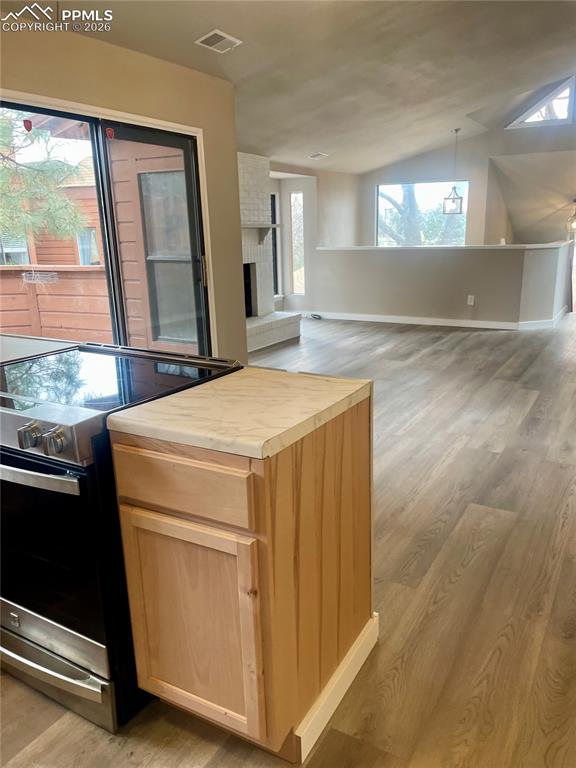 Open floor plan and lofted ceiling.