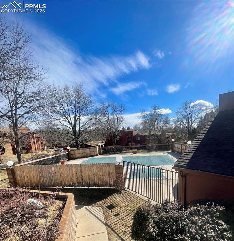 View of swimming pool with patio surround