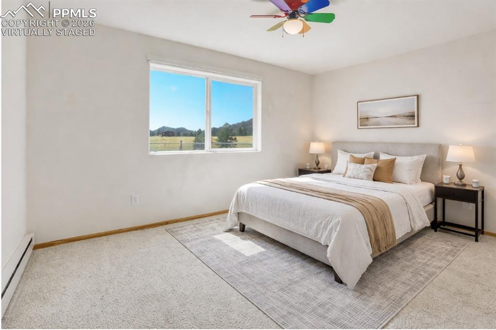 Virtually Staged - Bedroom with natural light and views of the surrounding area.