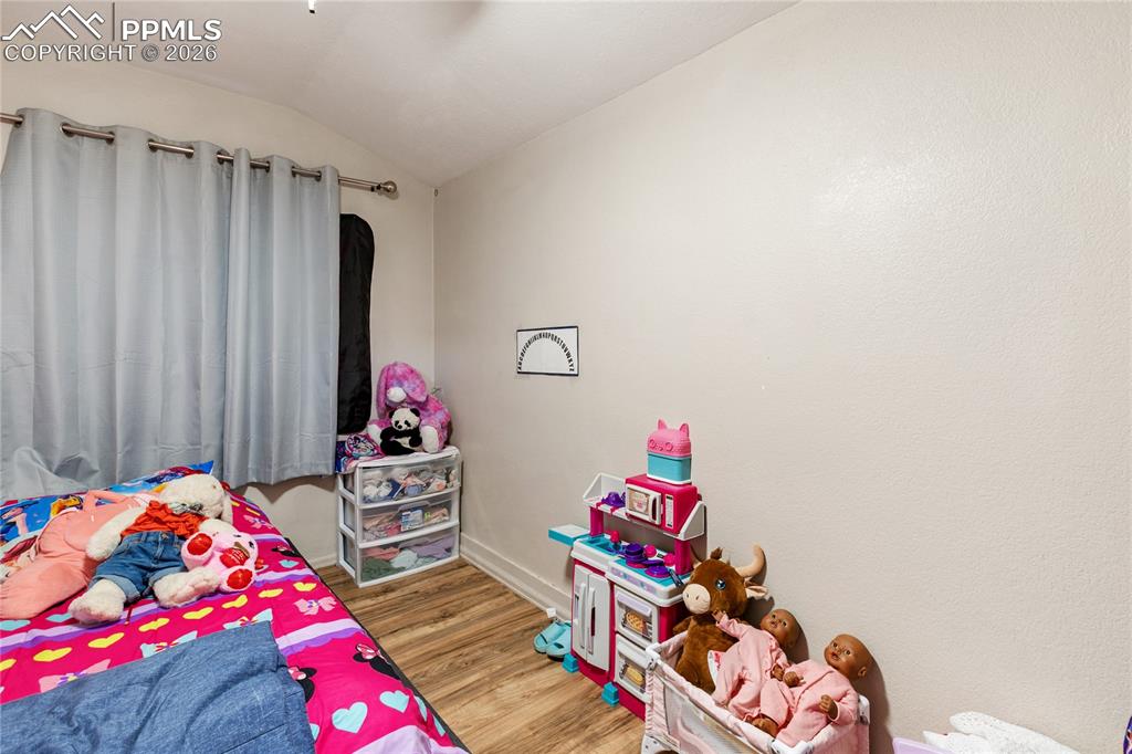 The second bedroom features wood-finished floors!