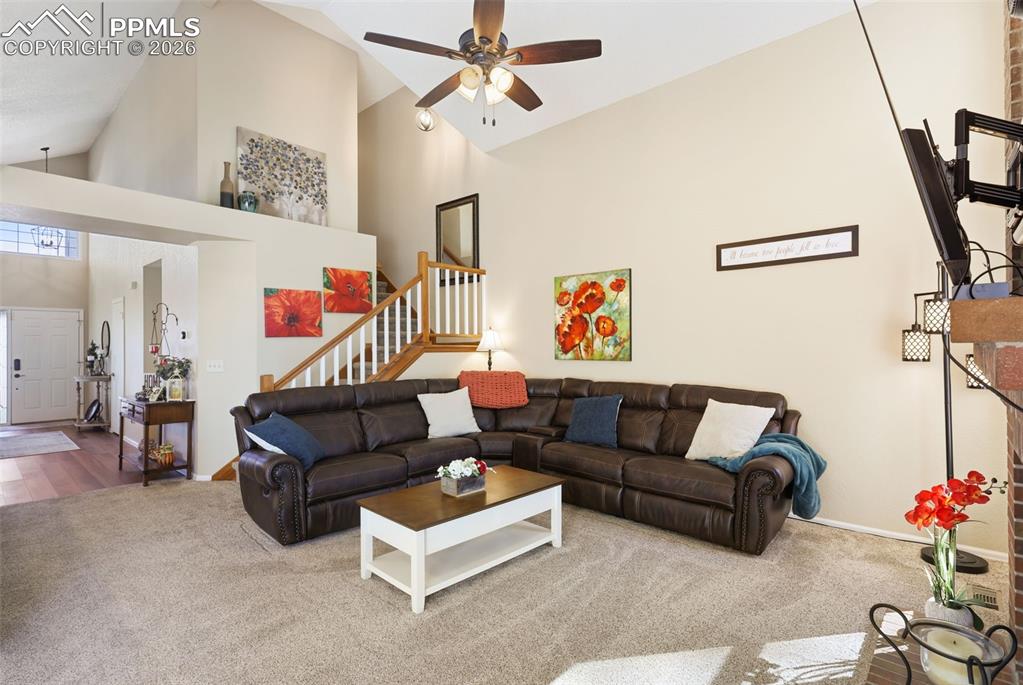 Family room featuring vaulted ceiling