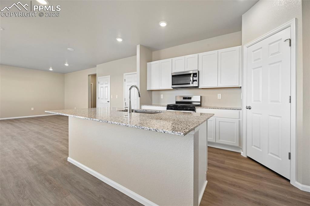 Gorgeous kitchen with stainless steel appliances and granite countertops 