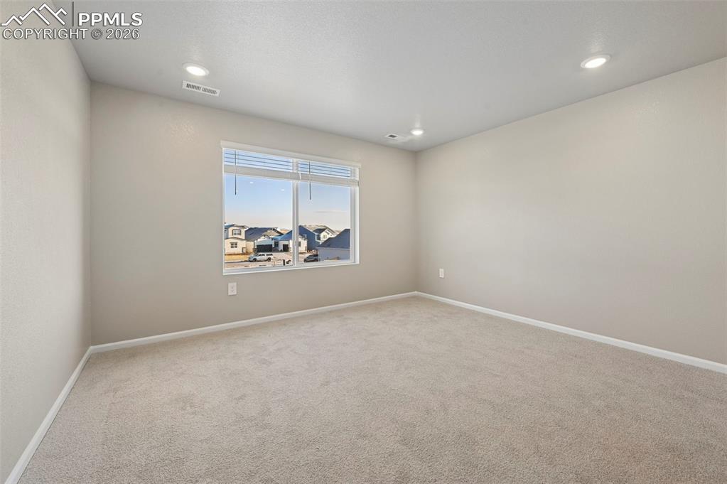Unstaged oversized loft at top of the stairs, serves as family room, game room, sitting area!
