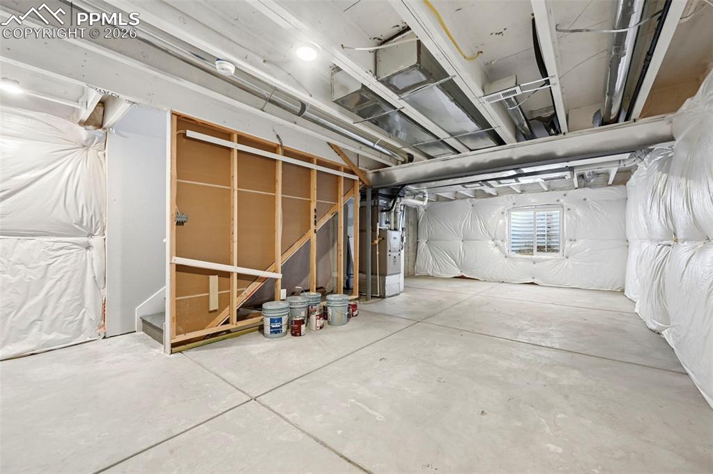 Unfinished basement awaits your creative finishes!  Game room or Theater room!
