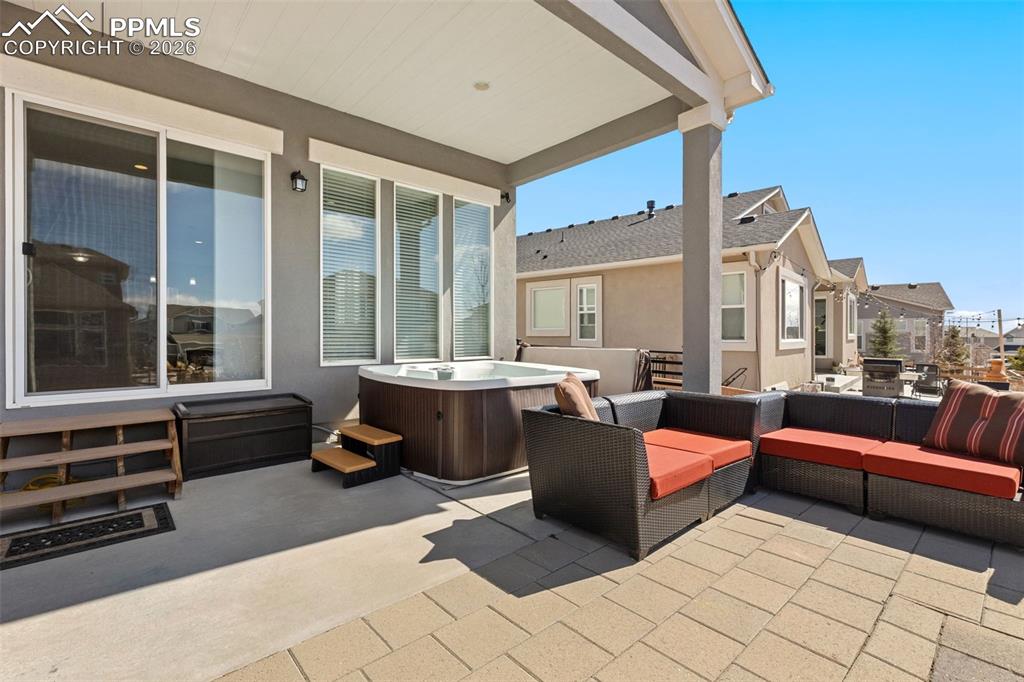 Backyard patio with hot tub