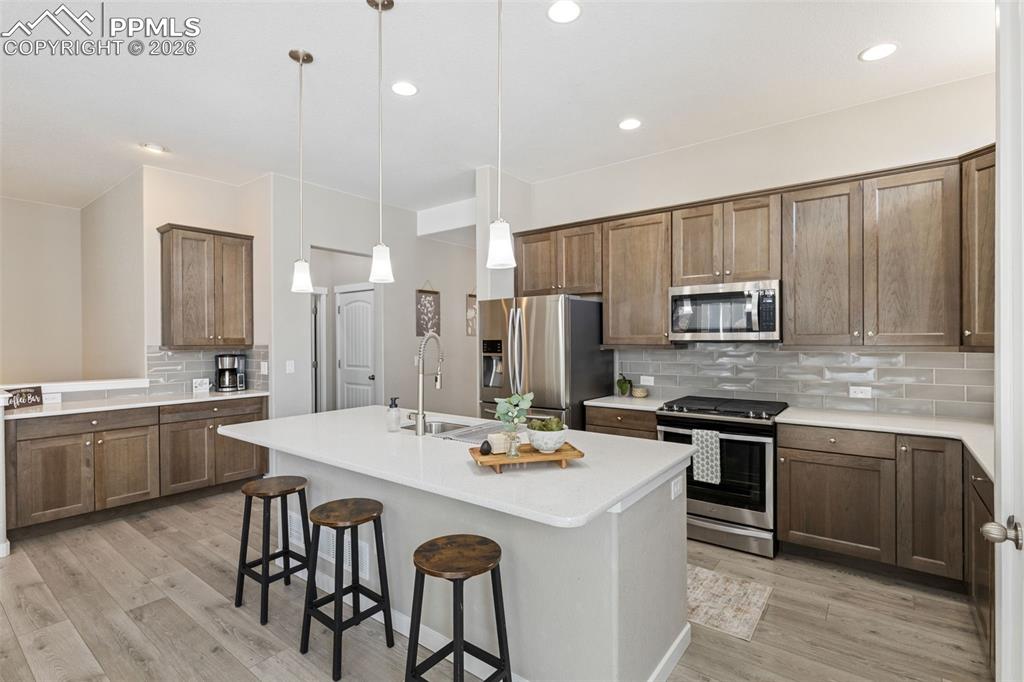 Huge island with coffee station to the left