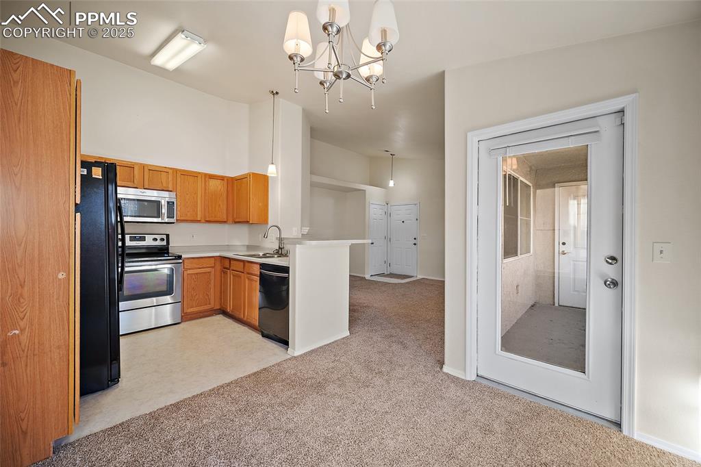 kitchen/dining area with walk-out