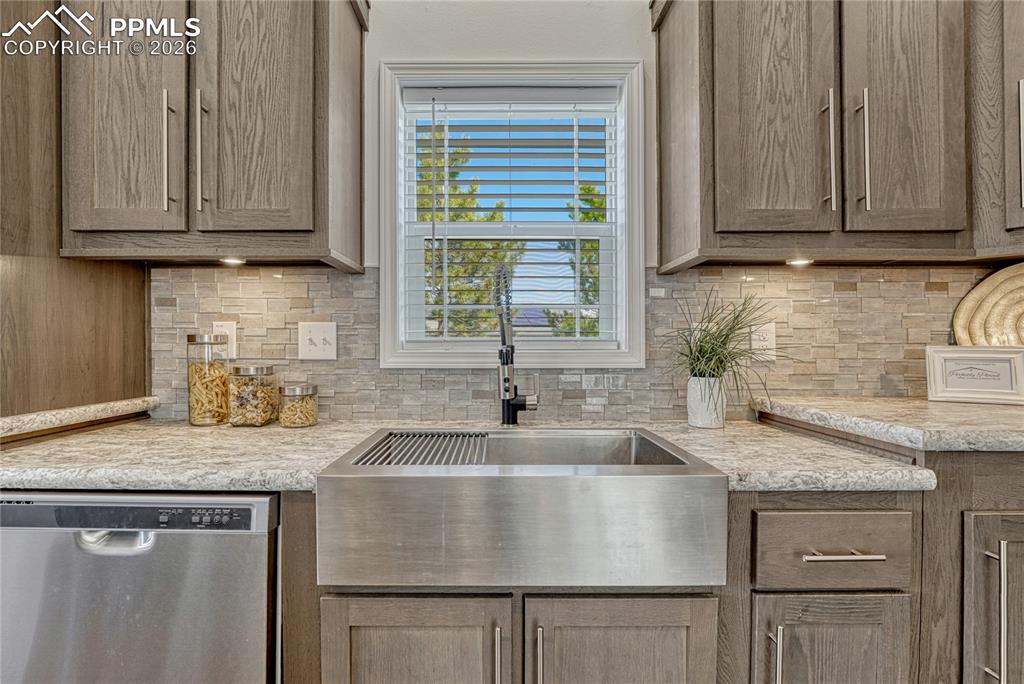 Stainless steel farm sink with a flexible sink faucet, sprayer and removable drying rack
