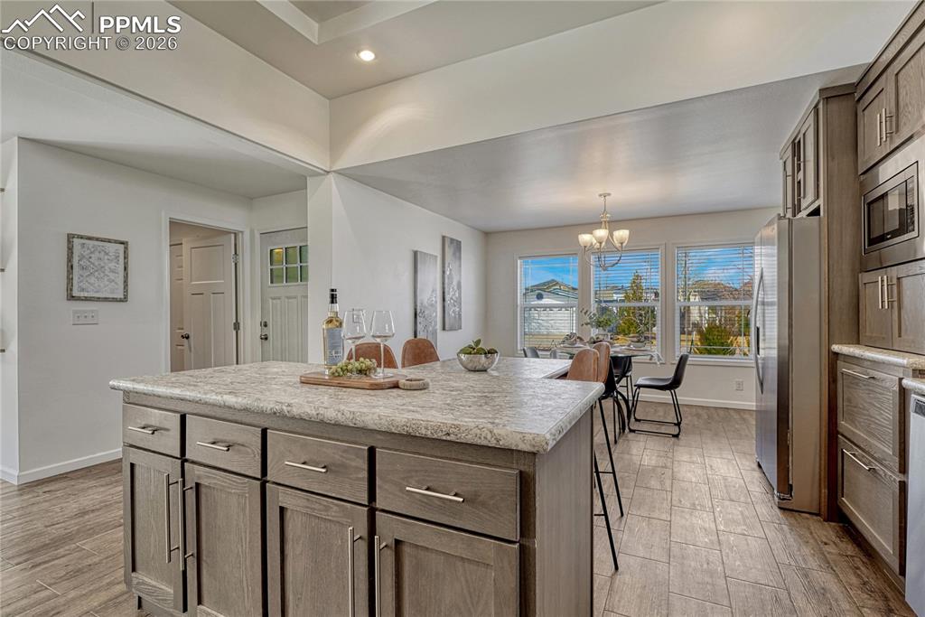 Across the kitchen, off the entry is the laundry room with access to the garage
