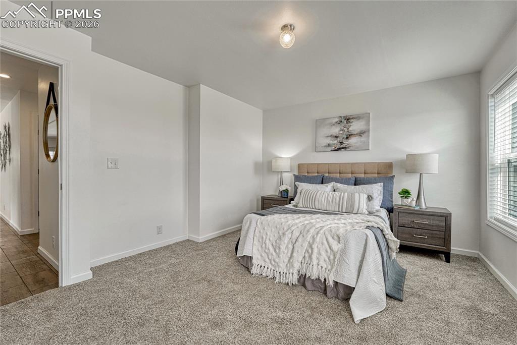 Large primary bedroom at the back of the home for extra privacy